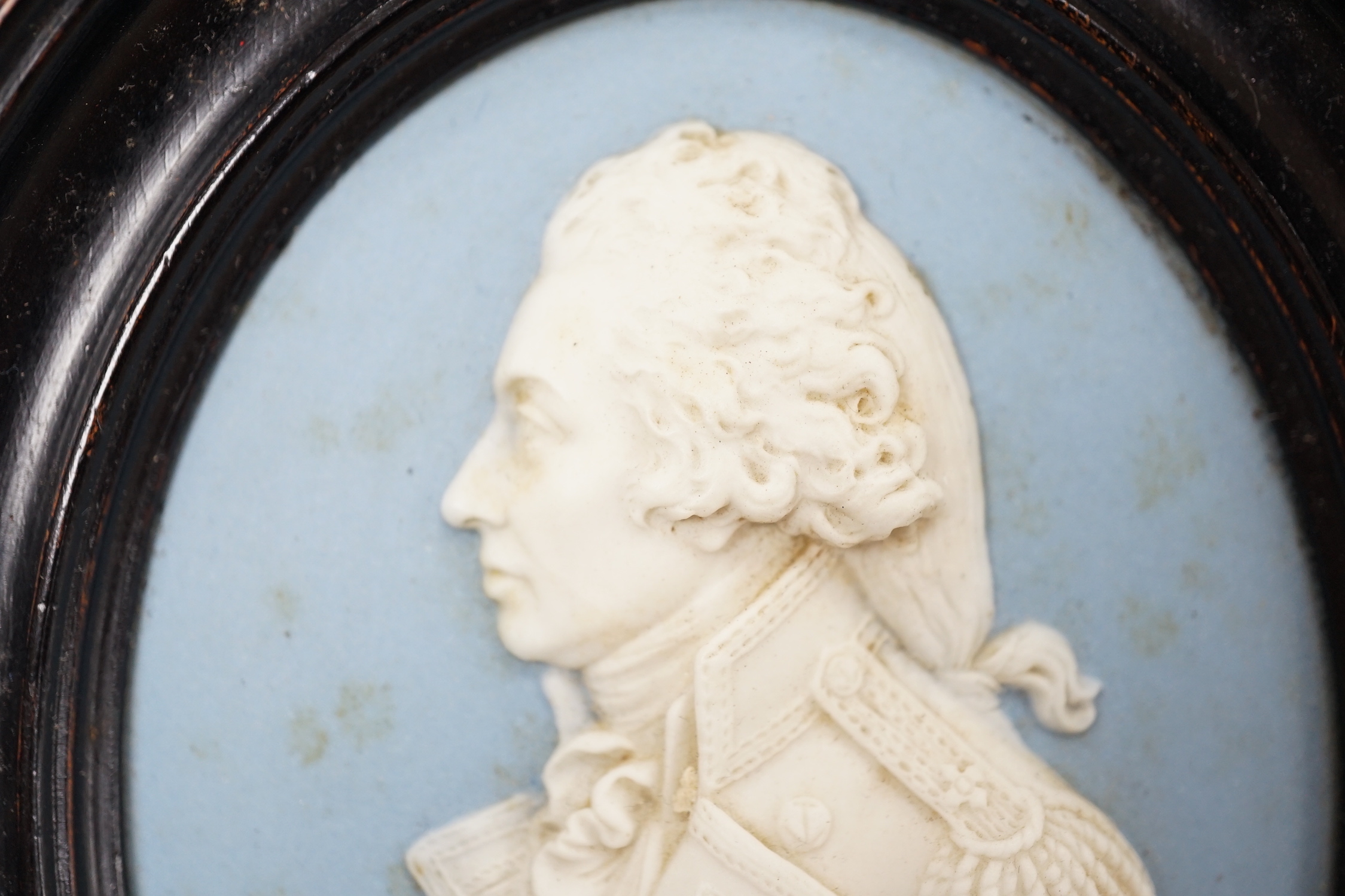 A framed Wedgwood Blue Jasper plaque, Lord Nelson, Frame 13.5cm high